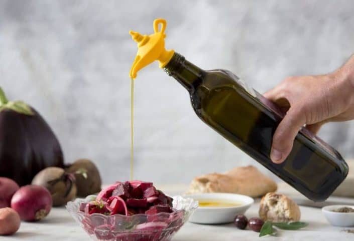 Aladdin Lamp Oil Pourer pouring oil over food