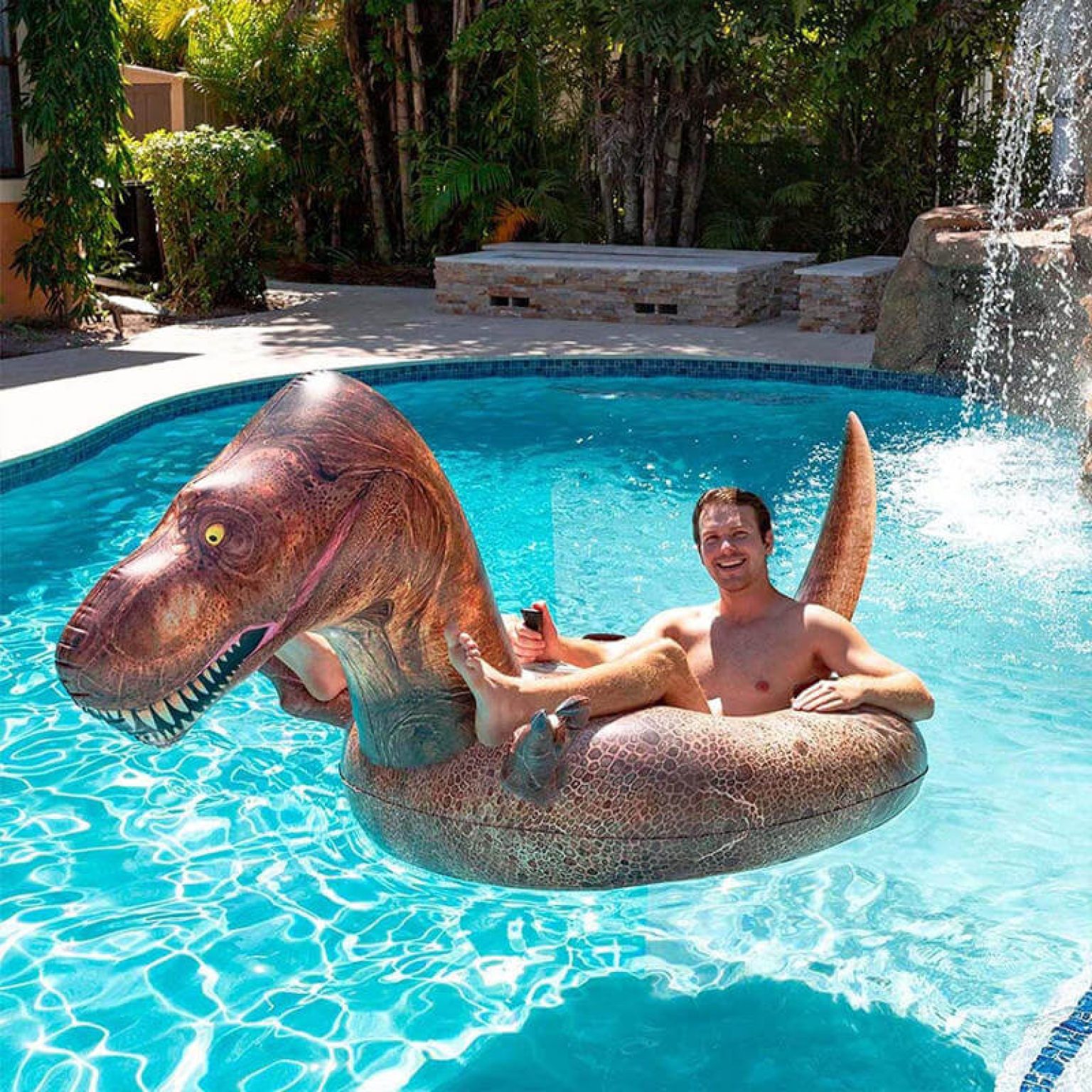 This Giant T-Rex Motorized Dinosaur Pool Float Will Provide Hours of ...